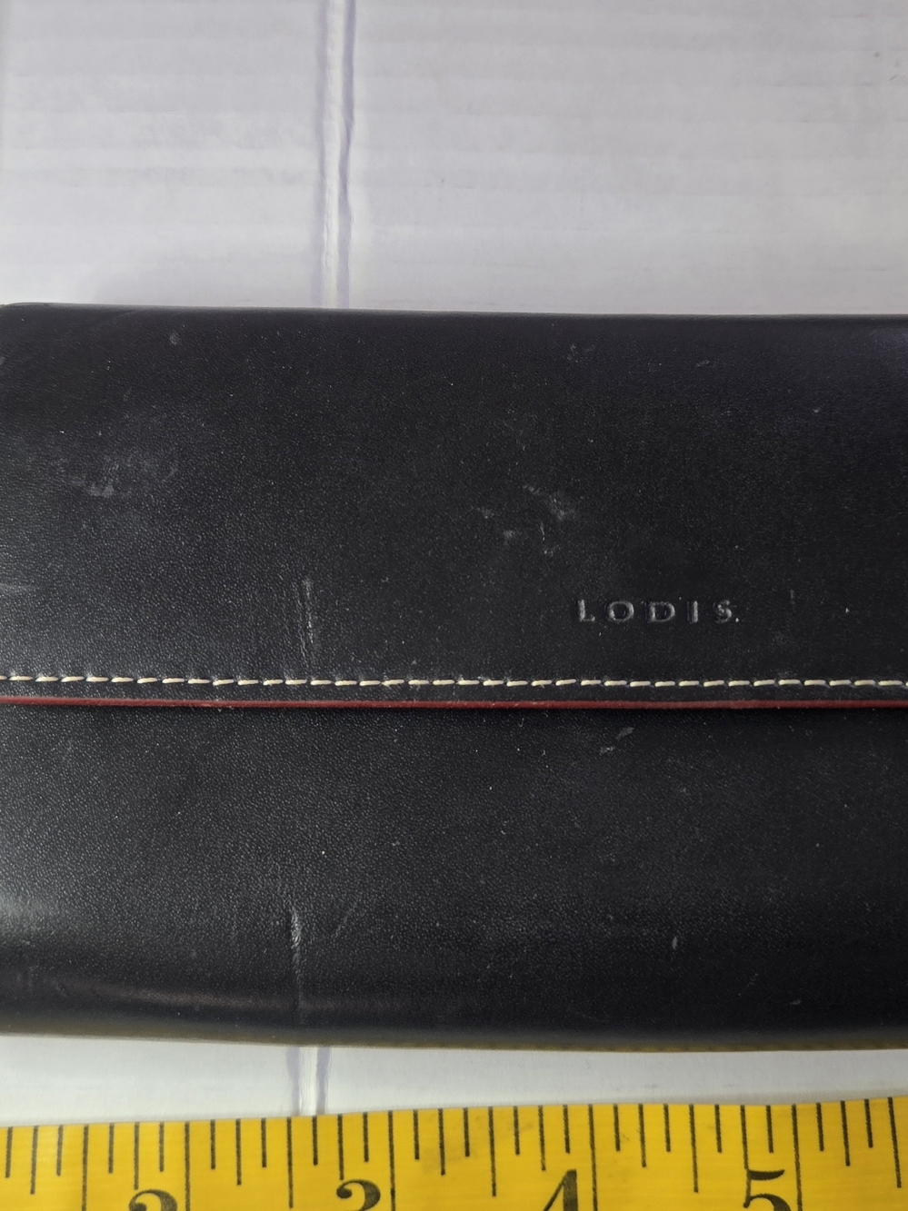 Lodis Black Leather Clutch Wallet with Red Trim
